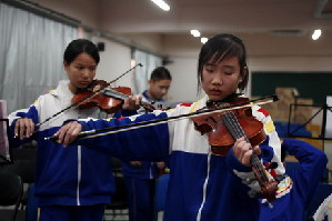 Touching orphans' souls with sound of music