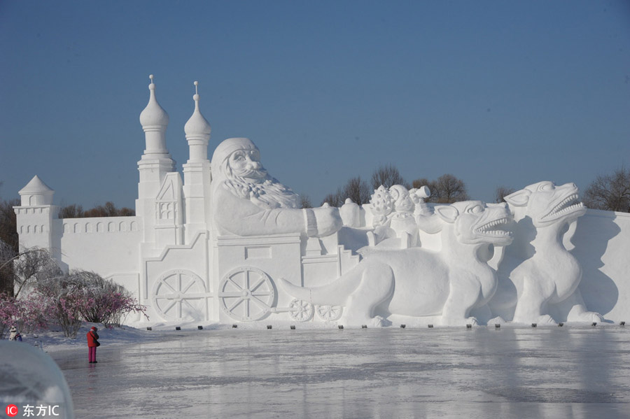 Snow sculptures and ice lanterns heat up Harbin