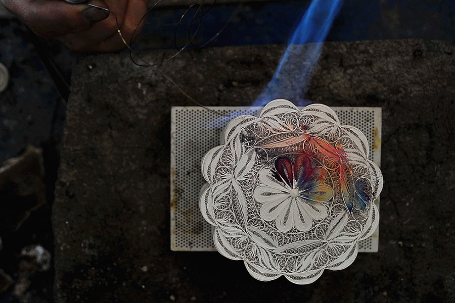 Hand-made silver mooncakes eagerly sought at market