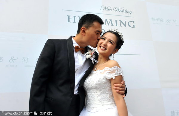 He Jie marries He Ziming in Beijing