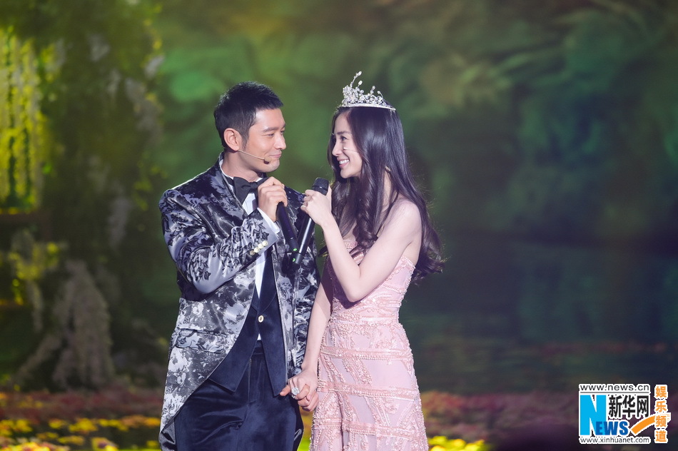 Huang Xiaoming, Angelababy attend New Year concert