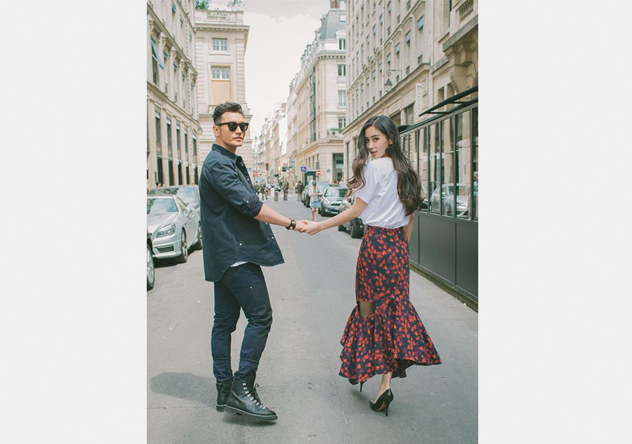 Huang Xiaoming and Angelababy spotted in Paris