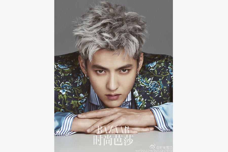 Kris Wu poses during a photoshoot for 'Bazaar Men' magazine.