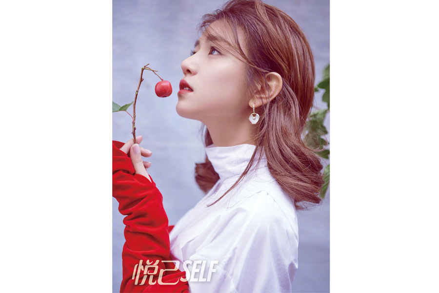 Actress Michelle Chen poses for fashion magazine