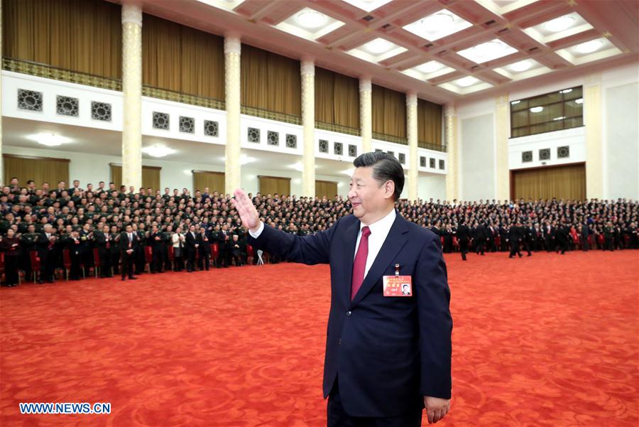 Xi meets congress delegates