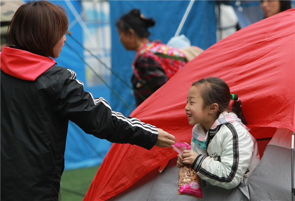 Child's smile soothes quake horror