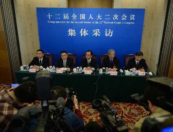 NPC deputies talk about industrial restructuring