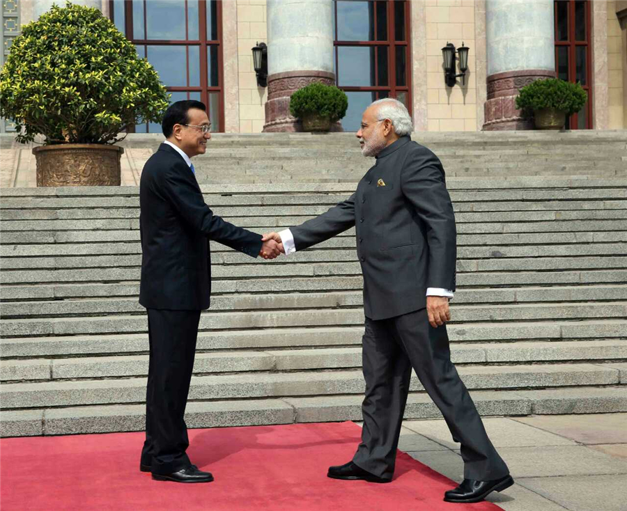 Premier Li holds welcome ceremony for Indian counterpart Modi