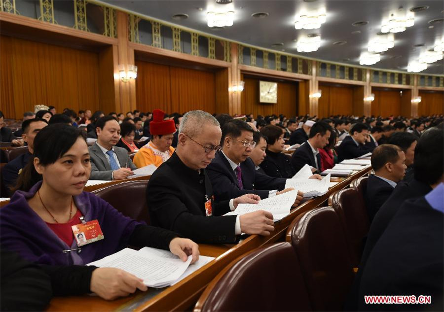 China's top legislator delivers work report