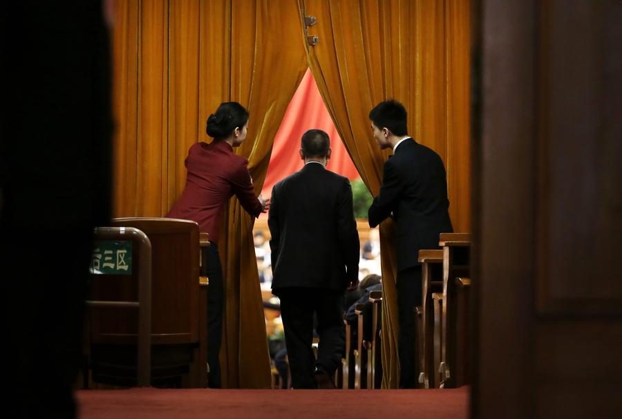 China's top legislator delivers work report