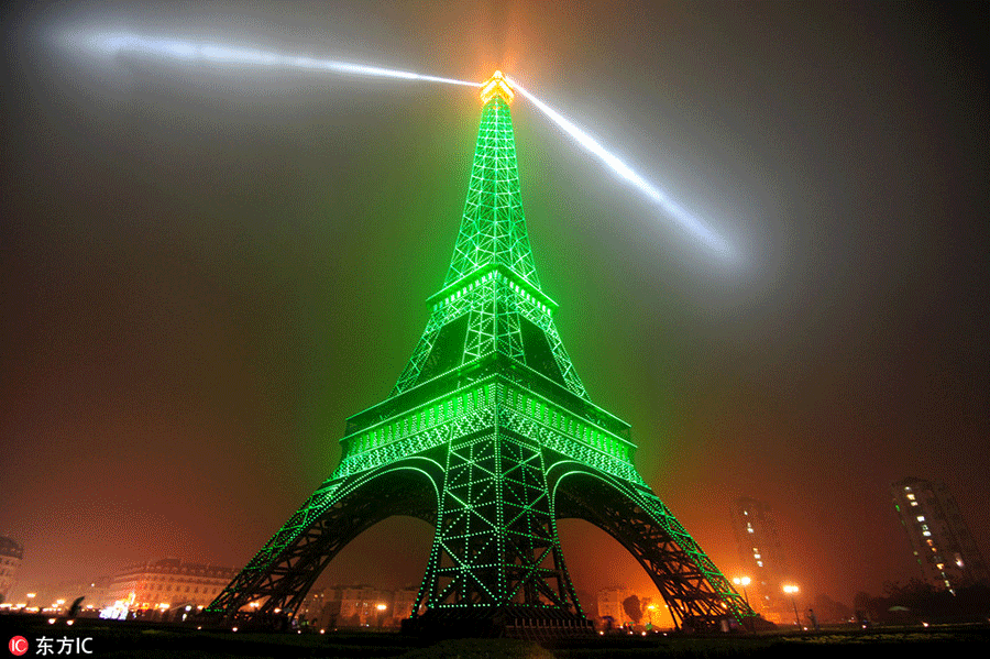 Replica of Eiffel Tower glows in E China's Hangzhou