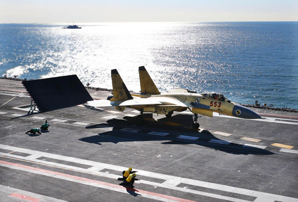 Jets land on China's 1st aircraft carrier