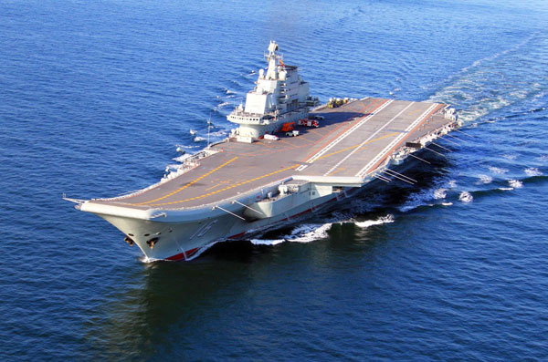 Jets land on China's 1st aircraft carrier