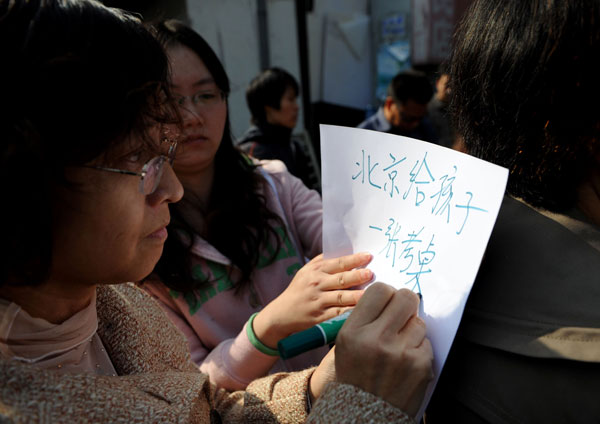 Changes in <EM>gaokao </EM>rules spark heated debate