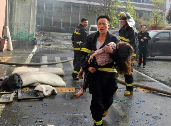 Death toll rises to 14 in central China hotel fire