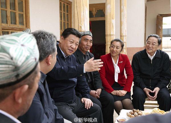 Xi visits border soldiers at Xinjiang base