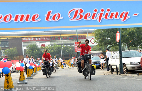 Duo ends pedal-powered journey from Paris to Beijing