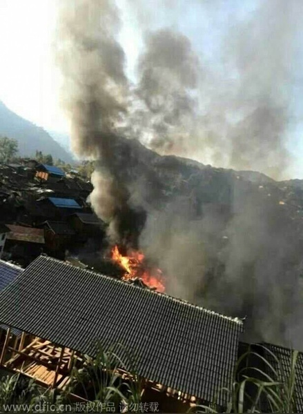 Fire engulfs ethnic village in SW China