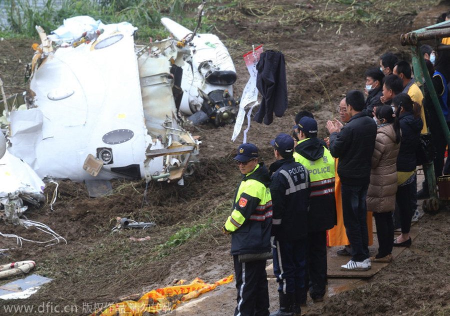 Family members mourn air crash victims