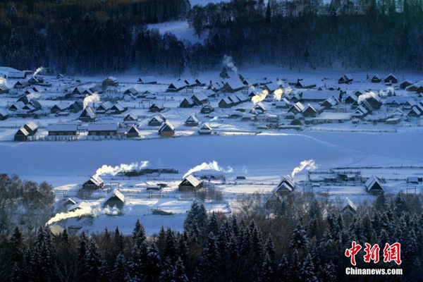 Snow turns village in Xinjiang into a fairy world