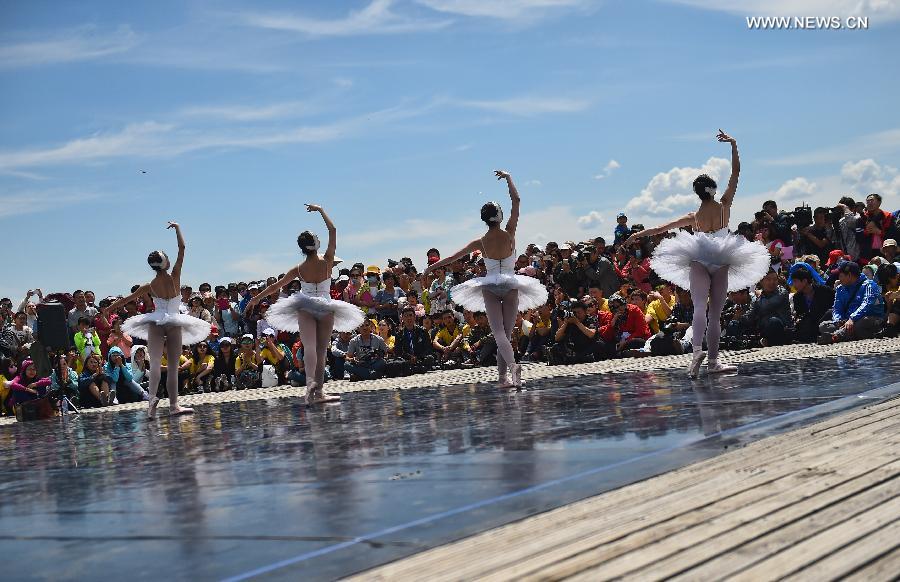 Ballet dancers perform at Zhalong National Nature Reserve in China's Qiqihar