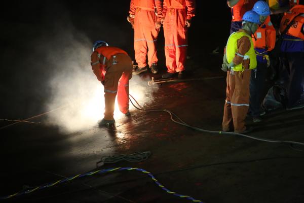 Rescuers begin to cut capsized ship in search for survivors