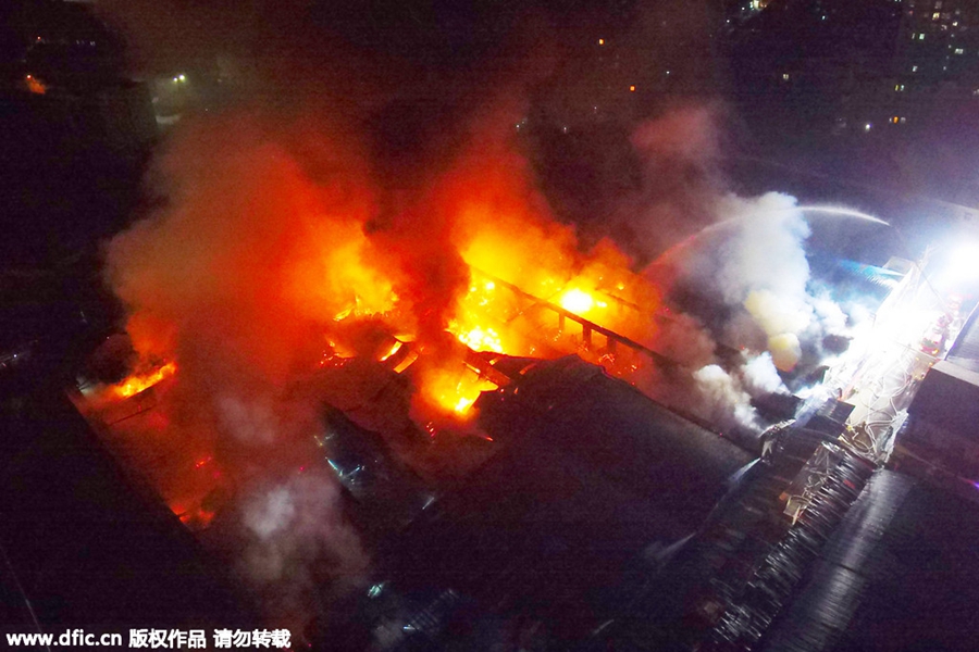 Fire engulfs grain and oil market in Shanghai