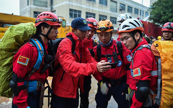 China cabinet sends group to coordinate landslide rescue