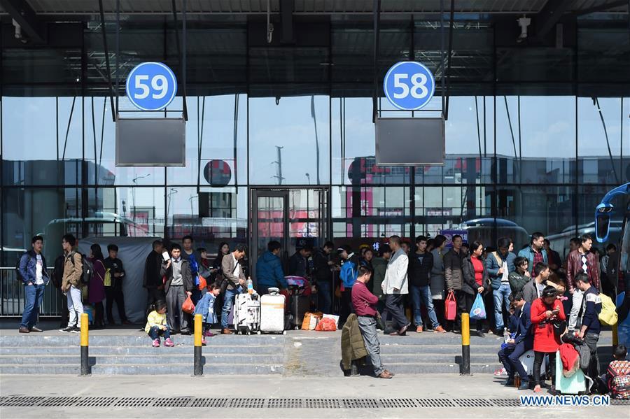 People start to return to work as Spring Festival holiday nearly ends