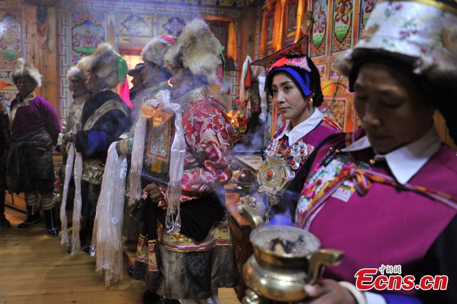 Young couple holds traditional Tibetan wedding ceremony