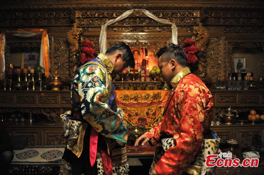 Young couple holds traditional Tibetan wedding ceremony