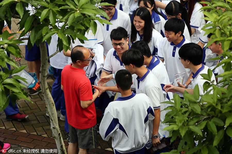 Hugs, anxious parents, high-tech security: China's college entrance exam starts