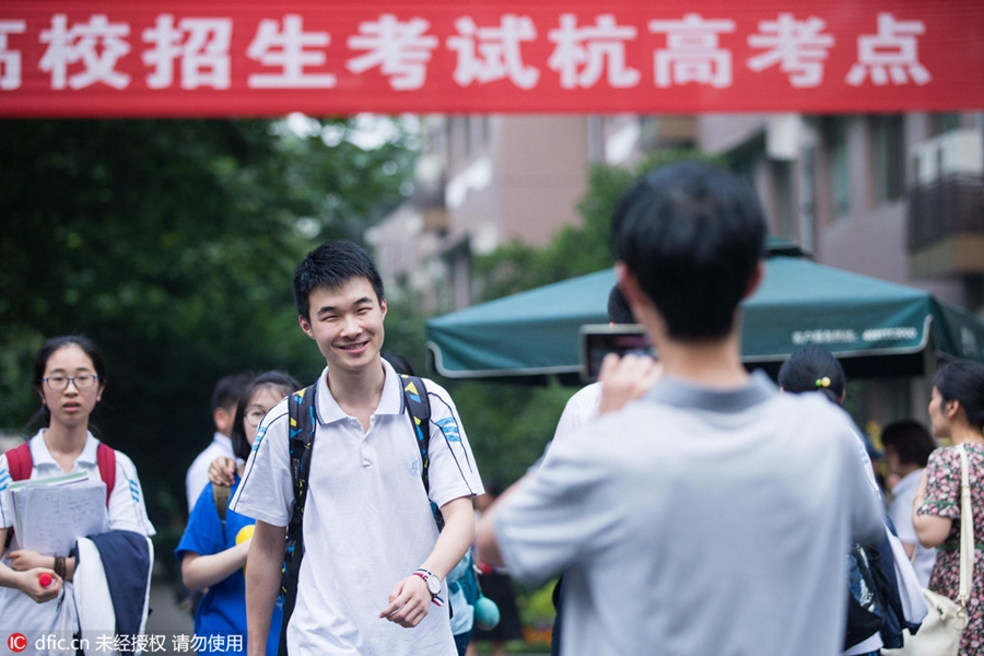 Hugs, anxious parents, high-tech security: China's college entrance exam starts