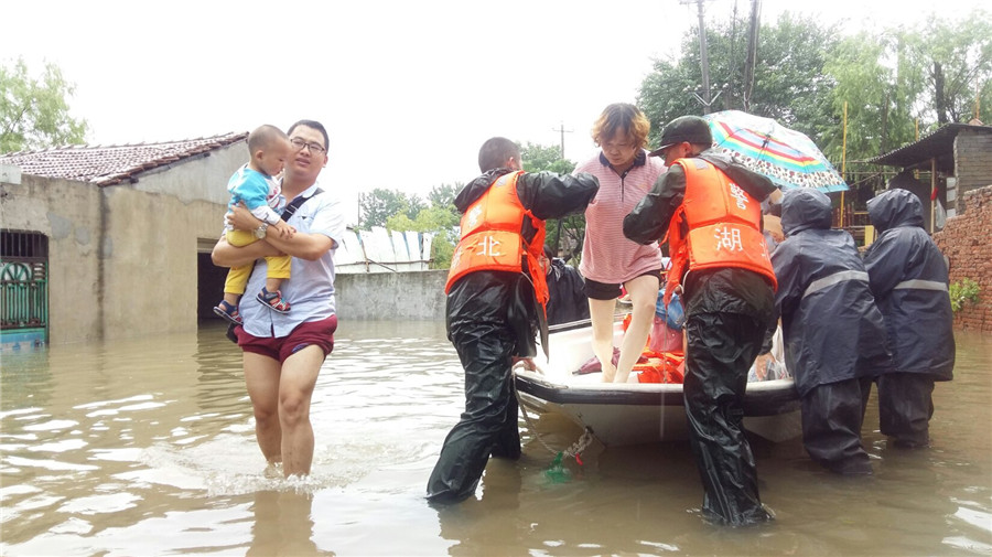 Remember emerging heroes in China's floods