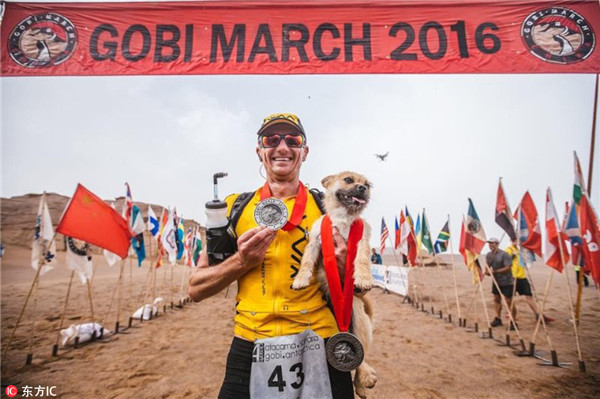 Nothing can separate marathon runner and his dog mate