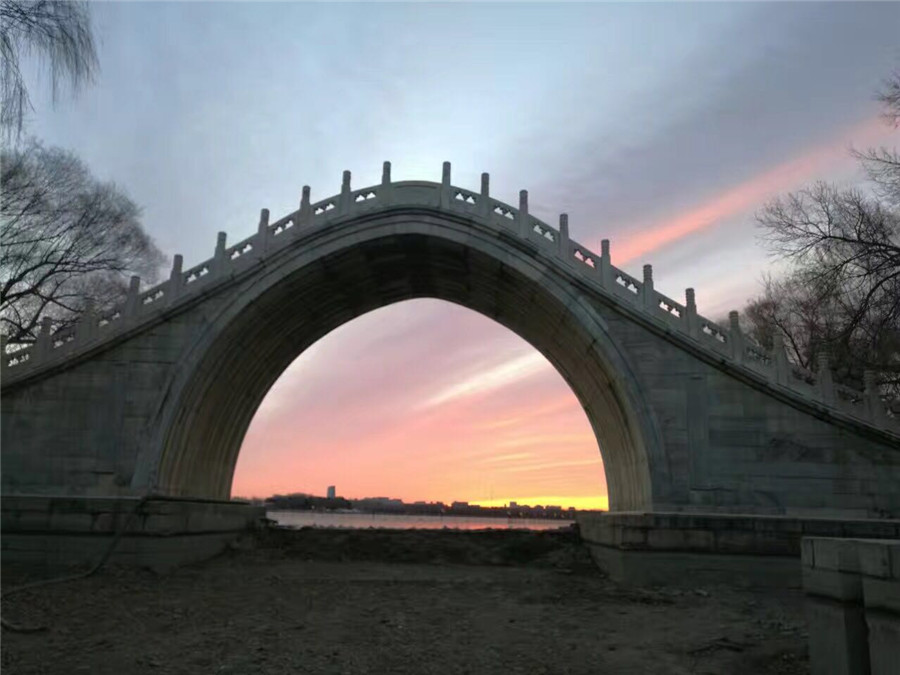 Beijing wakes to rosy dawn