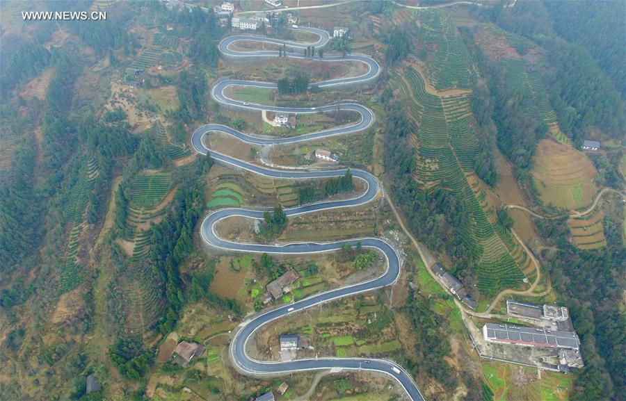 Winding road looks like jade belt around mountain in Central China