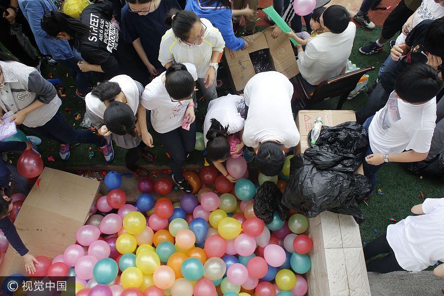 Unusual stress relief for students undertaking <EM>gaokao</EM>