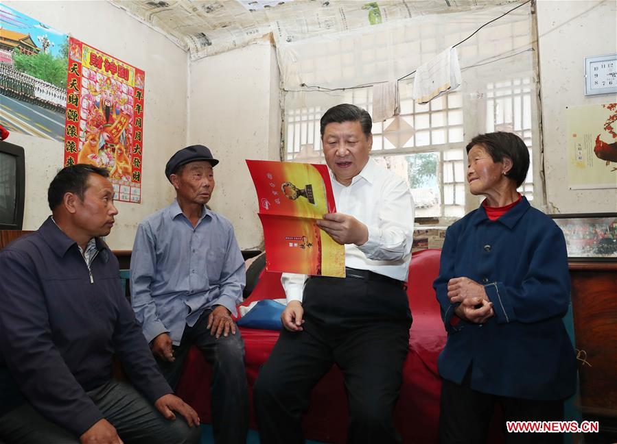 Xi's Shanxi tour steps up war on poverty