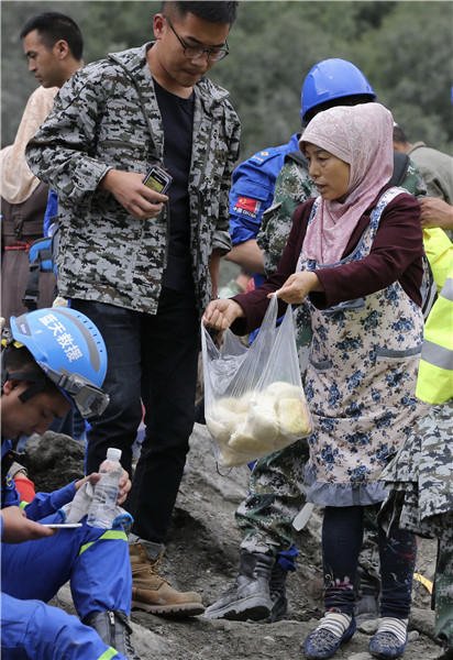 A tale of miracle survival amid desperate search for life in landslide-hit village