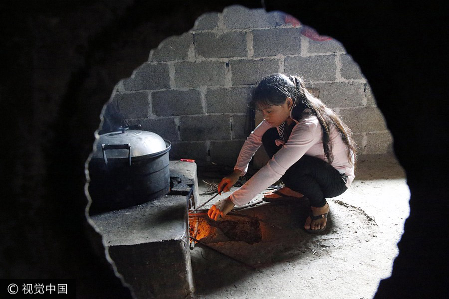 Teen who lived in a Guangxi cave starts high school