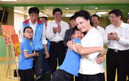 China's first lady visits children with autism in Beijing