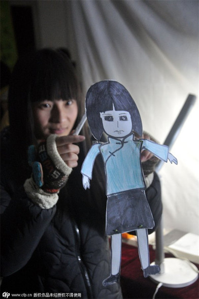 Students use puppetry to show Nanjing Massacre