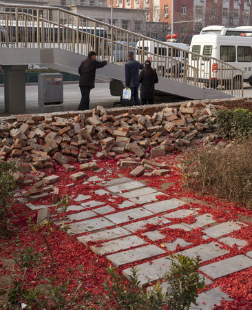 French artist tells photographic stories of Beijing