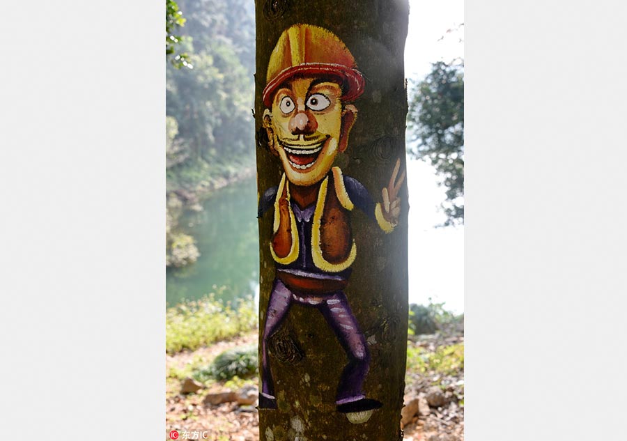 Paintings bring tree trunks to life