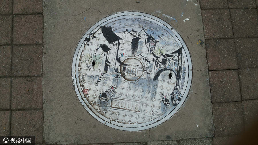 Students turn manhole covers into works of art