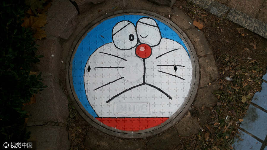 Students turn manhole covers into works of art