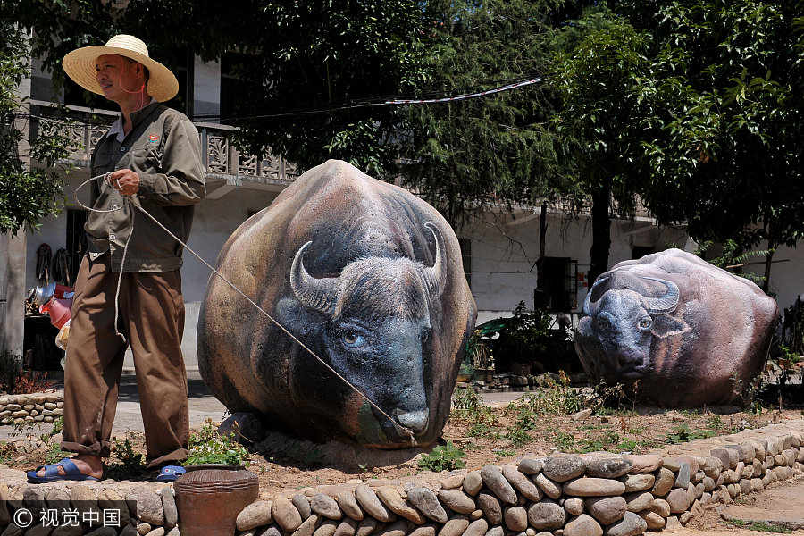 Vivid 3D paintings turn Zhejiang village into vibrant 'zoo'