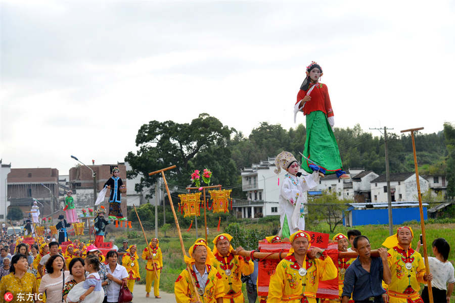 Folk dance Taige shows history, color and music in Wuyuan