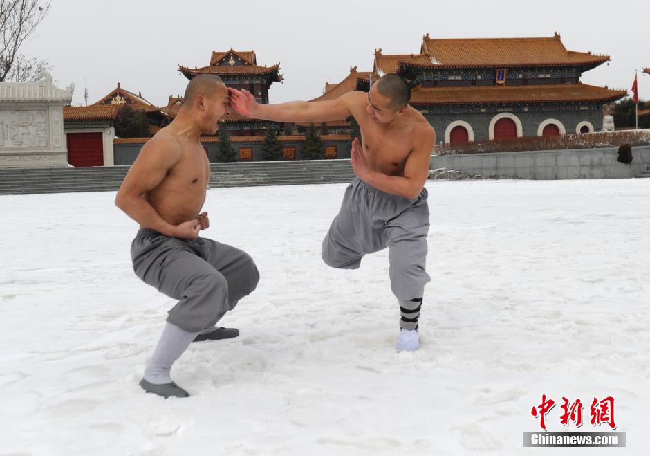 Monks practice Shaolin kung fu